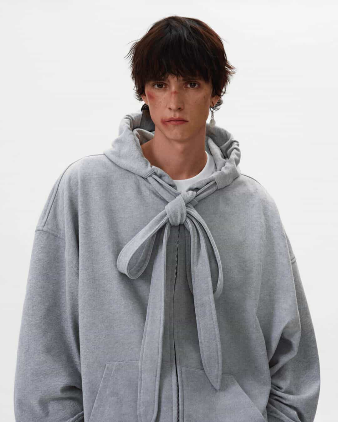 Unisex grey hoodie with tie-front hood from Revivo Avenue.