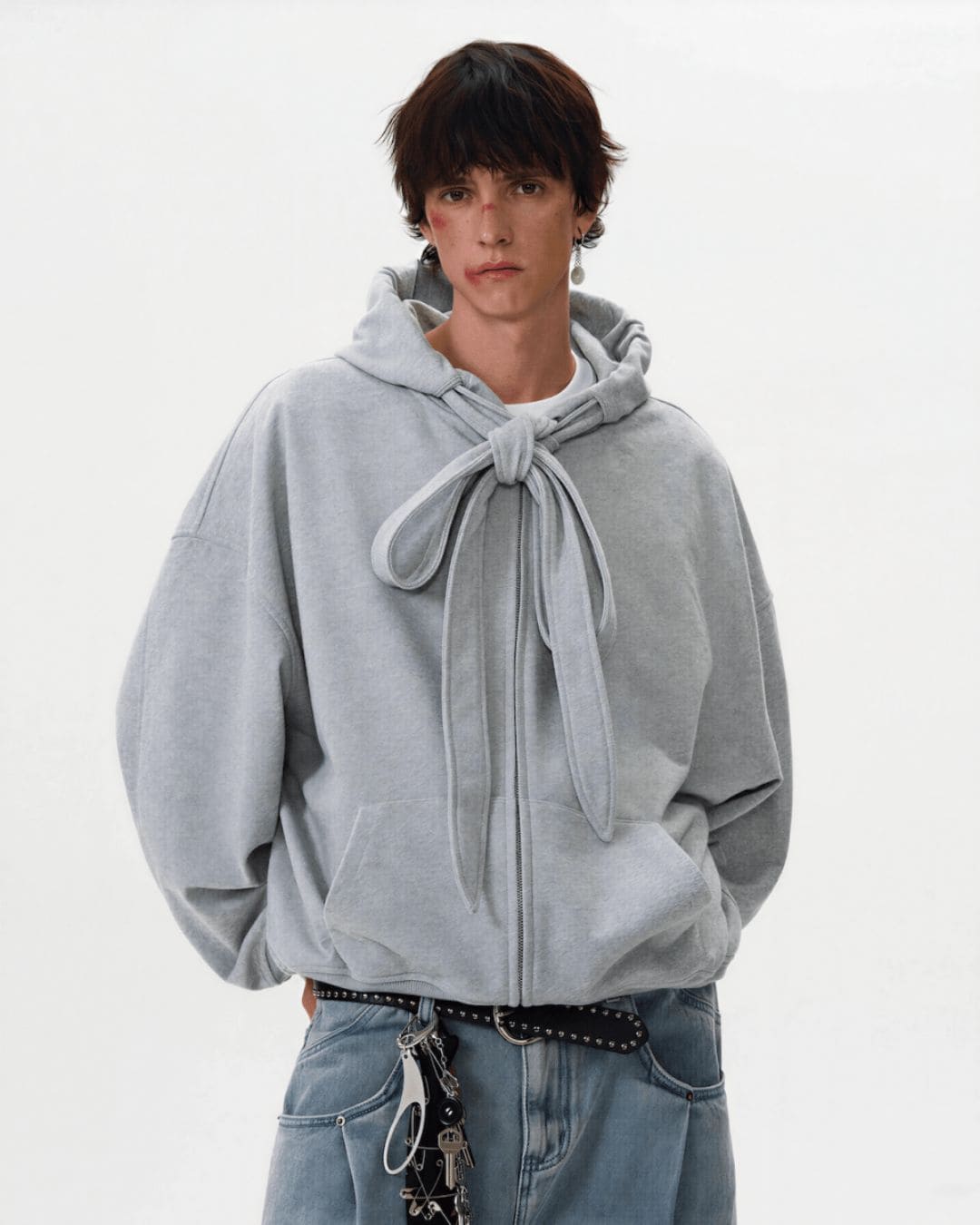 Unisex grey hoodie with bow tie detail from Revivo Avenue.