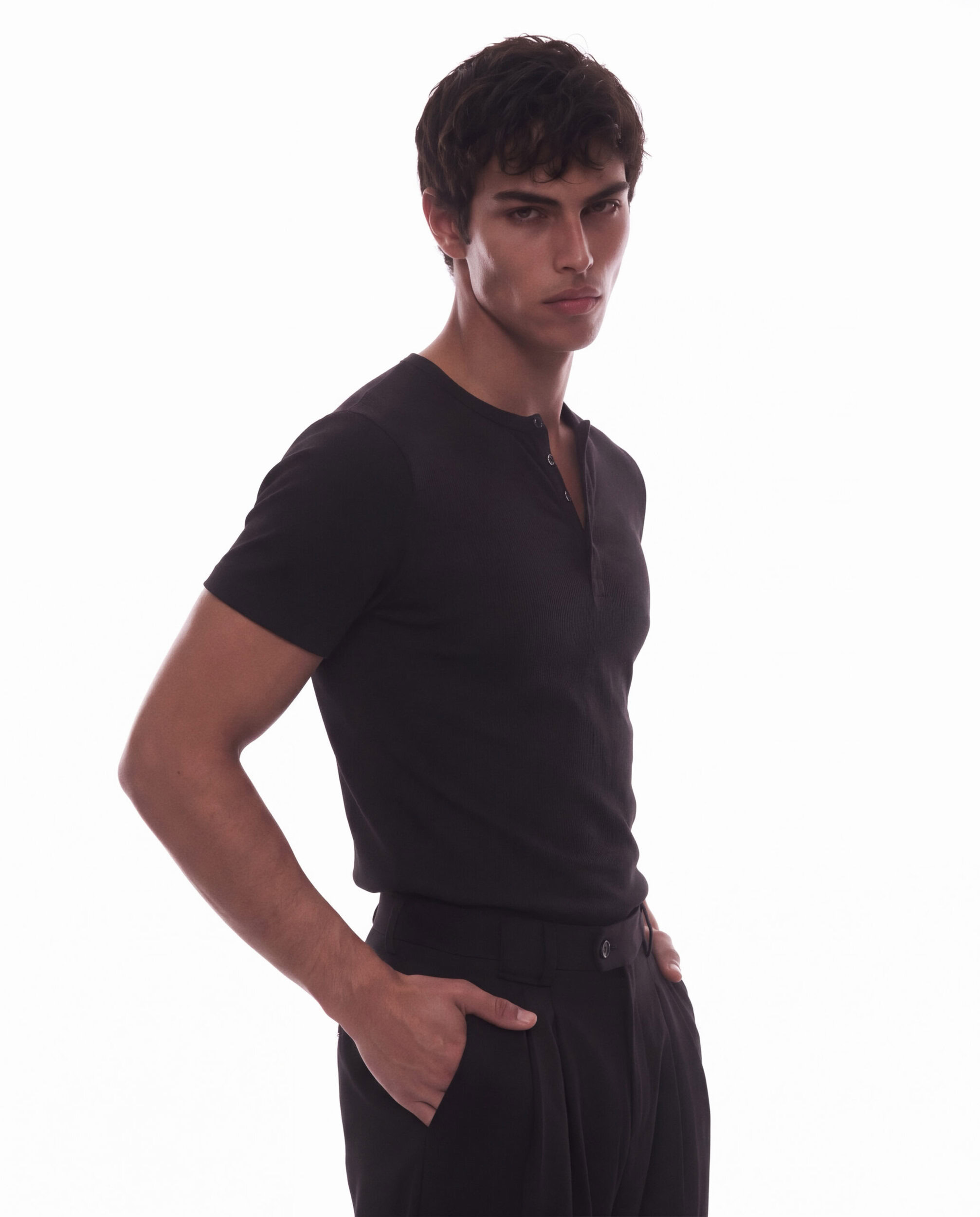 Unisex black Henley top by Revivo Avenue, size small, on male model.